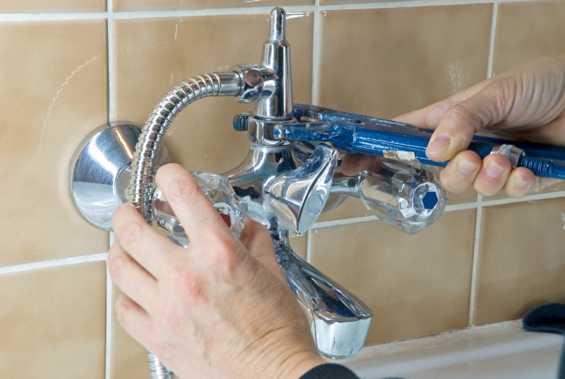 Shower being installed in a Brent Cross bathroom